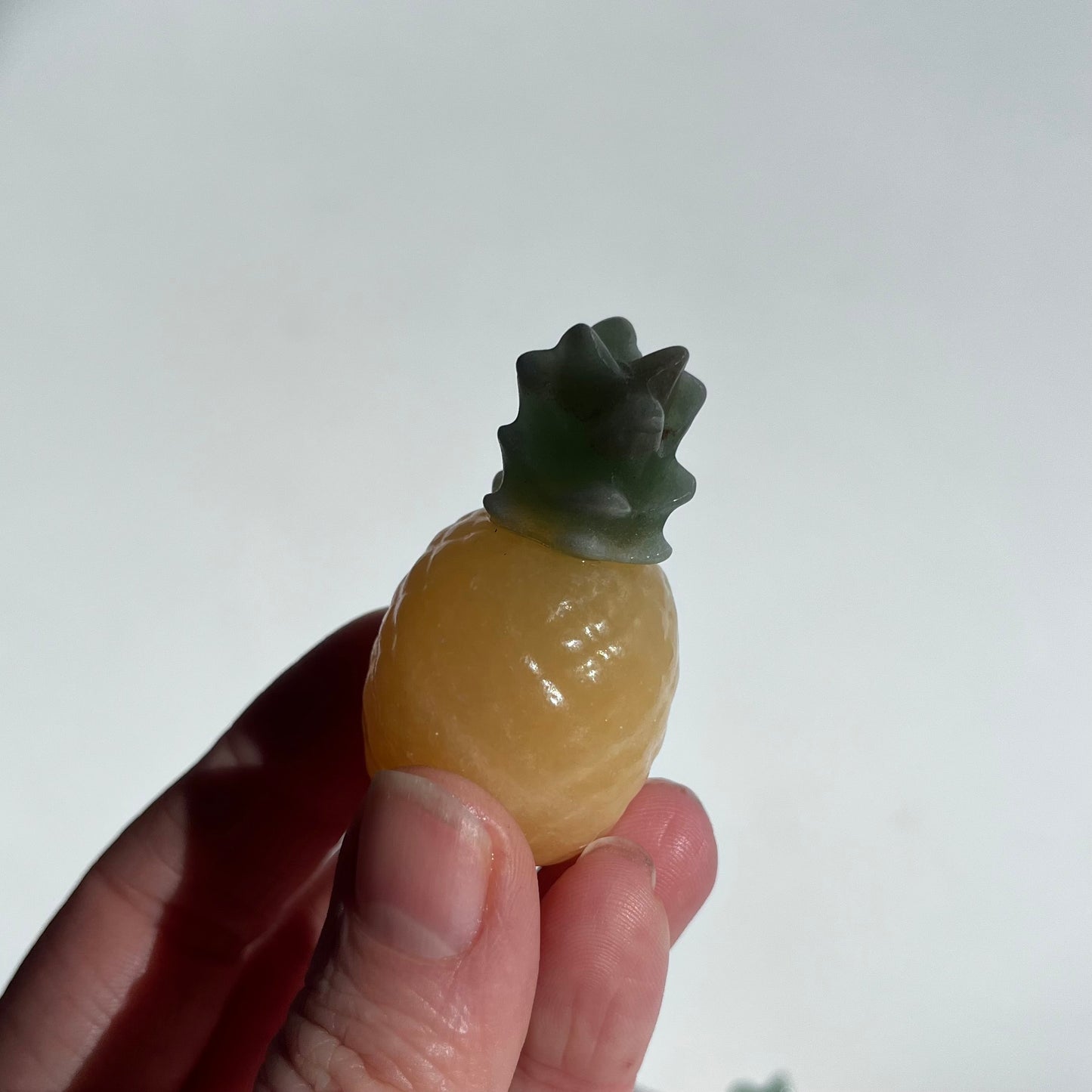 Orange Calcite and | Small Pineapple Carving
